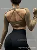Top deportivo para mujer Shark de manga larga, sin costuras, de secado rápido, con espalda cruzada y almohadilla en el pecho incorporada, estilo europeo y americano, para fitness y yoga
