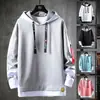Sudadera Falsa de Dos Piezas para Hombre en Primavera y Otoño Nuevo Estilo Coreano Tendencia Chaqueta con Capucha Juvenil y Atractiva Ropa Superior para Estudiantes para Hombres