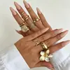 Joyería más vendida transfronteriza europea y americana: anillos abiertos florales de nicho de alta gama para mujer, accesorios de mano apilables elegantes y únicos
