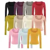 Top tipo camiseta puramente seductor, escote bajo, realza el busto, manga larga, dobladillo, nuevo para otoño, corte ajustado, longitud corta, camiseta básica sexy