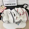Nuevo Conjunto Deportivo Infantil Primavera/Otoño 2026 Niños y Niñas Estilo Coreano Cardigan Bordado Sudadera Pantalones Deportivos Conjunto de Dos Piezas Moderno
