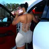En Stock Verano Nuevo Estilo Chica Picante Cuello en V Profundo Color Sólido Espalda Descubierta con Tirantes de Cuello Halter de Atar Moda Europea y Americana Ajustado Mono para Mujer