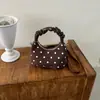 Este otoño e invierno, el bolso de lunares de moda es imprescindible.. Aquí está la nueva colección 2026: un bolso bandolera elegante y versátil, un bolso de mano delicado y un bolso de mano pequeño chic