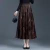 Nova Saia de Couro Plissada Outono 2026 para Mulheres, Cobre o Quadril, Linha A Emagrecedora, Saia de Comprimento Médio Fashion e Elegante
