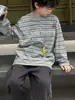 Camiseta de Algodón para Niños Cotton Shop Top de Otoño para Niños 2026 Nuevo Estilo Coreano Rayas Cuello Redondo Casual Capa Base Moda Infantil