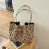 Bolso tote de lino de alta gama de nicho con lunares, nuevo modelo 2026, versátil para ir al trabajo, bolso de hombro y axila de gran capacidad