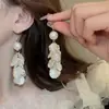 Pendientes de Flor de Perla de Lujo Ligero Francés Estilo Mori Diseño de Moda Ganchos para Orejas Temperamento de Nicho Accesorios de Pendientes de Alta Gama Venta al por Mayor