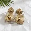 Pendientes de botón de doble capa con patrón de espiral étnico vintage transfronterizos, pendientes de cara pequeña de nicho, joyería de tachuela