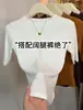 Camiseta de manga corta de cinco cuartos, cuello redondo, color liso, minimalista y elegante, estilo coreano, nueva colección otoño 2026, un top versátil y favorecedor para el trabajo o el uso casual, estilo mujer