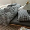 Juego de cuatro piezas de algodón 100% teñido en hilo y lavado, algodón puro, sin marca, suministrado por el fabricante, funda de edredón de alta calidad, sábana bajera de estilo japonés, ropa de cama al por mayor