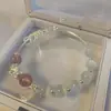 Diseño original ópalo natural cristal de fresa pulsera de la suerte simple lujo ligero diseño de nicho hilo elástico