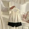 Conjunto de Verano para Niñas 2026 Nuevo Estilo Coreano Dulce Camisola con Lazo y Shorts de Mezclilla Rasgados Conjunto de Dos Piezas