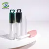 Shanyi Plástico Galvanizado Tubo de Gloss Labial em Formato de Coração Tubo Vazio Tubo Redondo de Gloss Labial com Gancho Embalagem de Óleo Labial 5ml Material para Venda por Atacado