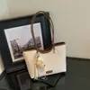 Ruien Bolsa Feminina Elegante Simples de Grande Capacidade 2026 Outono Nova Bolsa de Ombro para o Trabalho Bolsa Tote de Mão