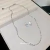 Nuevo collar y pendientes de circón brillante para mujer, lujo ligero con un toque de alta gama, cadena para la clavícula ultrabrillante, accesorio versátil de moda para el día a día