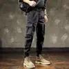 Pantalones con forro polar para hombre marca moderna estilo coreano pantalones casuales holgados para hombre pantalones cortavientos cropped pantalones casuales de trabajo estilo Hong Kong ins