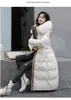 [En stock] Nuevo abrigo de algodón acolchado de longitud media, ajustado y adelgazante para mujer, con cuello grande de pelo, de Corea del Sur Dongdaemun, para otoño e invierno
