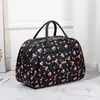 Bolsa de viaje portátil directa de fábrica, bolsa de equipaje, bolsa de regalo de PU, bolsa de tamaño, bolsa de embarque de viaje corta impermeable, venta al por mayor