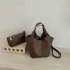 Bolso de mano vintage transfronterizo para mujer, nuevo bolso de hombro de nicho para el trabajo 2026, bolso cruzado casual de principios de otoño