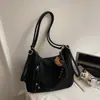 Bolsa Feminina Nova Estilo Coreano Vintage Moda Primavera 2026 Bolsa de Ombro para o Trabalho Bolsa de Mão de Nicho Bolsa Tote Vintage