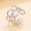 Anillo Ovalado Geométrico Hueco Retro Transfronterizo para Mujer con Textura Brillante y Diseño Asimétrico Anillo Que No Se Desvanece Joyería