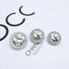 Botones de metal con incrustaciones de diamantes de alta calidad, de nicho de lujo ligero, para chaqueta de abrigo de lana estilo Chanel europeo y americano, botones para chaqueta de traje