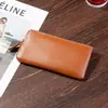 2025 Estilo Coreano Nova Carteira Longa de Couro Carteira Feminina Ultrafina Simples Casual com Zíper Porta-Celular Clipe de Couro Macio