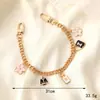 Yilian novo estilo Chanel Pérola cadeia portátil dupla cadeia pulseira pulseira caixa de telefone chaveiro-cadeia resistente a quedas atacado