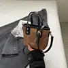 Bolsos de Nicho de Estilo Occidental de Moda 2026 Primavera Nuevo Bolso de Hombro Cruzado Vintage Bolso de Mano de Moda Bolso Cubo para Mujer