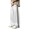 Pantalones deportivos estilo americano de tres rayas para hombre, nueva colección primavera/otoño 2026, pantalones rectos de corte holgado, pantalones largos casuales modernos y versátiles