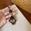 Nuevo Collar Colgante de Resina Estilo Étnico Chino Marrón Retro para Mujer Lanyard Cadena de Clavícula Accesorios Nuevo Estilo 2026