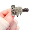 Nuevo Broche Pin Sencillo de Zirconia Negra tipo Pistola con Dibujo de Mapache Accesorios de Moda de Corea del Sur Pinza de Pato para Mujer