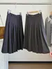 Falda Larga de Mezcla de Lana Gris para Mujer 2026 Otoño Nuevo Estilo Forma de Pera Cintura Alta Adelgazante Cubre Caderas Línea A Plisada Midi