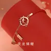 Pulsera de Koi Año del Dragón para Mujer 2024 Nuevo Estilo Hebilla Segura Cuerda Tejida a Mano Cuerda Roja de Benmingnian Pulsera de Lujo Ligero de Nicho