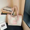 Bolsa de Ombro Grande Capacidade Estampa de Letras Moda Casual Estilosa Texturizada Simples Novo Estilo Bolsa Tote Feminina Primavera 2026
