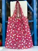 Bolsa de compras casual de moda para niñas transfronteriza, bolso de mano de nailon, bolsa de almacenamiento para mercado de alimentos de supermercado, puede ser al por mayor