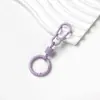 Llavero de aleación de zinc con forma de macarrón pintado en aerosol, disponible en stock, mosquetón de resorte mini, hebilla colgante multicolor para bolsa y juguete