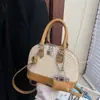 Bolsa de Concha Retro de Nicho Transfronteiriça para Mulheres Nova Cor Combinada Versátil Bolsa de Mão de Alta Qualidade para Comutação Ombro Cruzada