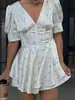 Vestido floral de cuello en V con mangas abullonadas y fruncido en la cintura, estilo puro deseo primavera-verano, fruncido en la cintura con ballenas, falda corta irregular con volantes