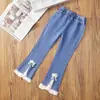 Jeans para Niña 2026 Primavera y Otoño Nuevo Estilo Pantalones Largos Elásticos Súper Suaves para Niños Pantalones Acampanados Elegantes para Niña con Adorno de Encaje