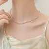 Collar Shijia de cuentas ultrafinas con cierre de palanca para mujer, cadena de clavícula de temperamento de nicho de lujo ligero, perla de imitación de vidrio brillante