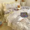 Estilo INS juego de ropa de cama de invierno de terciopelo de leche de cuatro piezas con encaje más terciopelo funda de edredón sábana falda de cama juego de tres piezas 4 ropa de cama