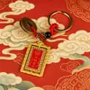 Estilo étnico chino aleación "La Bendición del Oficial Celestial" llavero colgante decoración accesorio metálico venta al por mayor desde fabricante