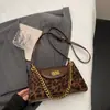 Bolsa de Axila Estampa de Leopardo de Nicho para Mulheres 2025 Outono Nova Versátil Retro Bolsa de Ombro de Alto Padrão para o Dia a Dia Bolsa Transversal