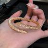 Europa y Estados Unidos pulsera de serpiente de circón transfronteriza diseño de nicho femenino chapado en 18k pulsera abierta de hueso de serpiente pulsera de moda venta al por mayor