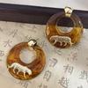 Pendientes He Chaolian con forma de tigre circular, elegantes y avanzados, diseño de nicho, 2024