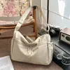 Bolsa Tote Versátil de Grande Capacidade para Mulheres Moda Casual Tendência Nova Primavera 2026 Bolsa de Ombro Transversal de Nicho