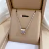 [Acero de titanio de cuerpo completo] Collar de oro real con tres anillos, cintura pequeña, personalidad minimax, horno de viento, cadena de clavícula roja de red para mujer