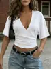 Exclusivo para ventas transfronterizas: Camiseta de color sólido para mujer, con escote en V pronunciado, hombros descubiertos, manga corta, volantes laterales, ceñida a la cintura, corta, que deja ver la cintura, top sexy
