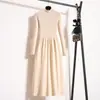 Ropa para mujer talla grande 2026: Vestido suéter ajustado de manga larga con cuello semi-alto, perfecto como capa interior de punto o como vestido independiente, combinado con un abrigo